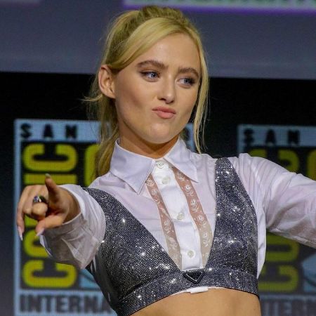 Kathryn Newton posing for a picture while pouting
